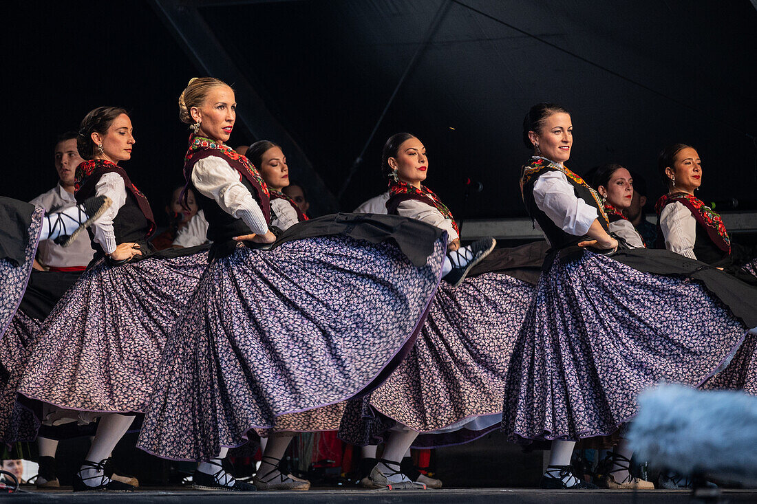 Baluarte Aragones and Raices de Aragon, Aragonese traditional Jota groups, perform in Plaza del Pilar during the El Pilar festivities in Zaragoza, Spain\n