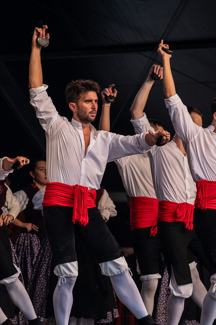 Baluarte Aragones and Raices de Aragon, Aragonese traditional Jota groups, perform in Plaza del Pilar during the El Pilar festivities in Zaragoza, Spain\n