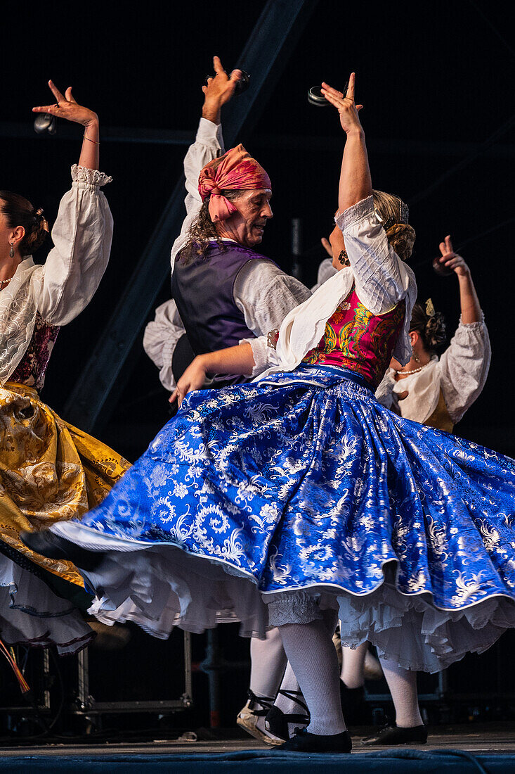 Baluarte Aragones and Raices de Aragon, Aragonese traditional Jota groups, perform in Plaza del Pilar during the El Pilar festivities in Zaragoza, Spain\n