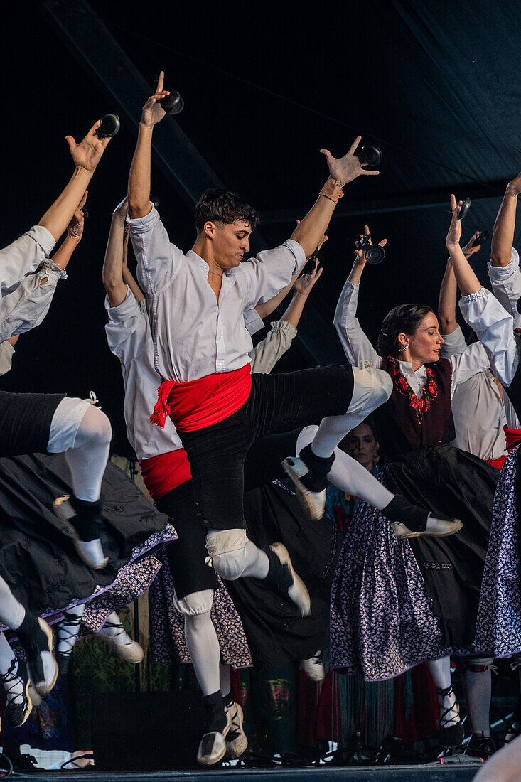 Baluarte Aragones and Raices de Aragon, Aragonese traditional Jota groups, perform in Plaza del Pilar during the El Pilar festivities in Zaragoza, Spain\n