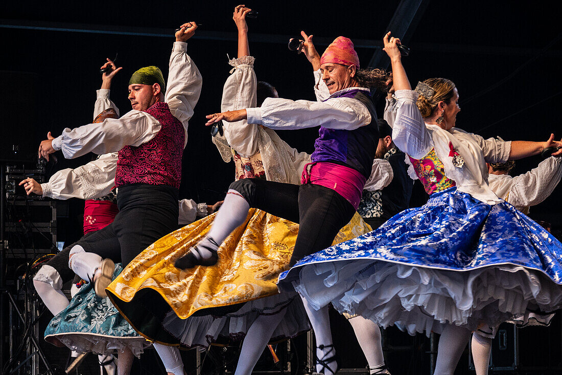 Baluarte Aragones and Raices de Aragon, Aragonese traditional Jota groups, perform in Plaza del Pilar during the El Pilar festivities in Zaragoza, Spain\n