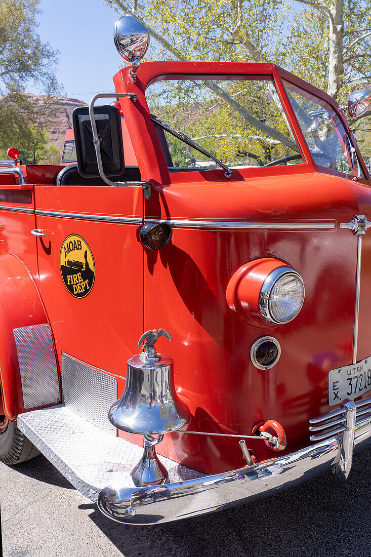 Detail of a 1948 Series 700 American LaFrance fire engine pumper truck in a car show in Moab, Utah.\n