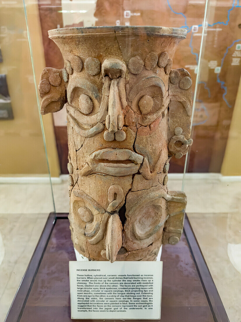 A ceramic incense burner in the museum in the Xunantunich Archeological Reserve in Belize.\n