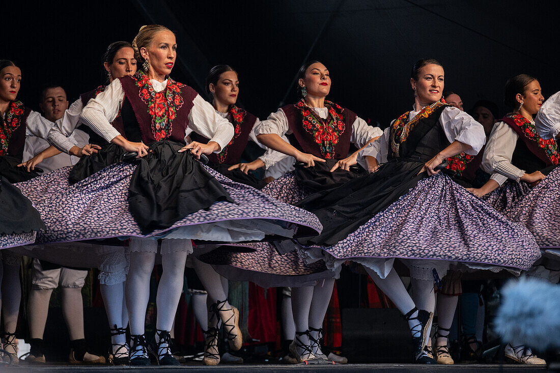 Baluarte Aragones and Raices de Aragon, Aragonese traditional Jota groups, perform in Plaza del Pilar during the El Pilar festivities in Zaragoza, Spain\n