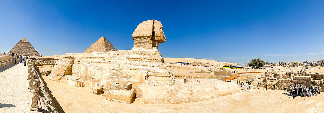 Panoramic view of the Sphinx and the Great Pyramid of Giza, the oldest of the Seven Wonders of the World, UNESCO World Heritage Site, Giza, Cairo, Egypt, North Africa\n