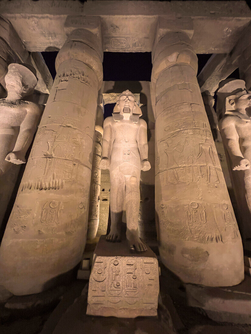 The Luxor Temple at night, a large Ancient Egyptian temple complex constructed approximately 1400 BCE, UNESCO World Heritage Site, Luxor, Thebes, Egypt, North Africa, Africa\n