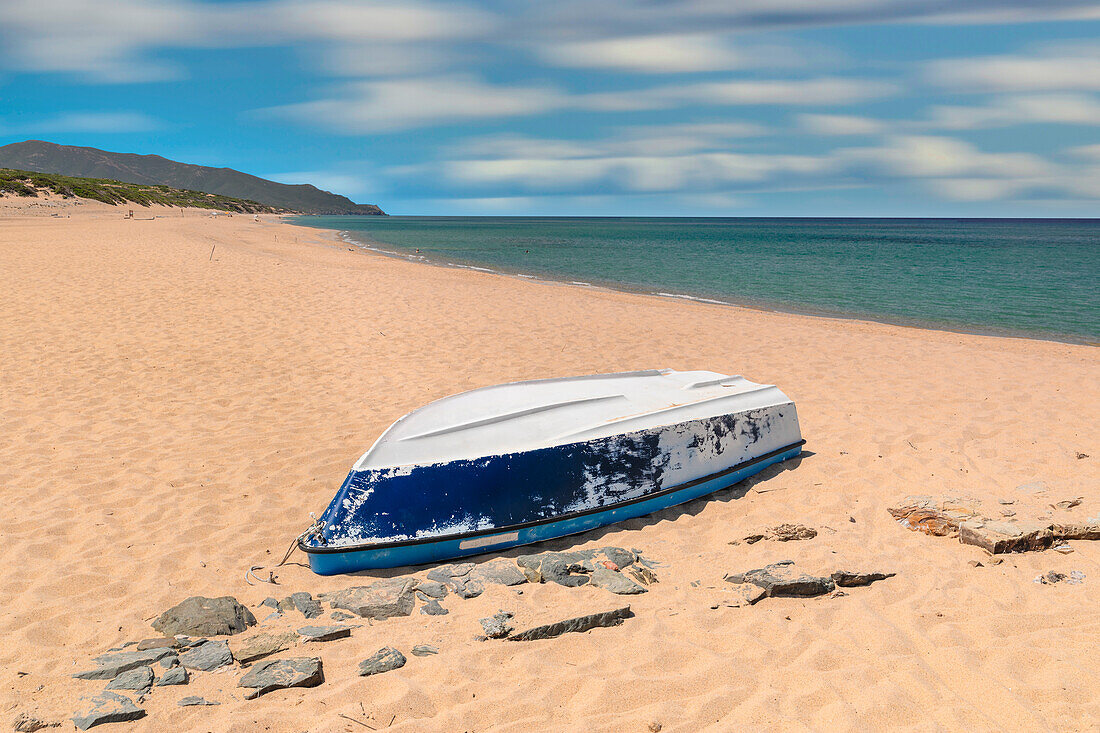 Upturned boat on Scivu beach, Arbus, Sud Sardegna district, Sardinia, Italy, Mediterranean, Europe\n