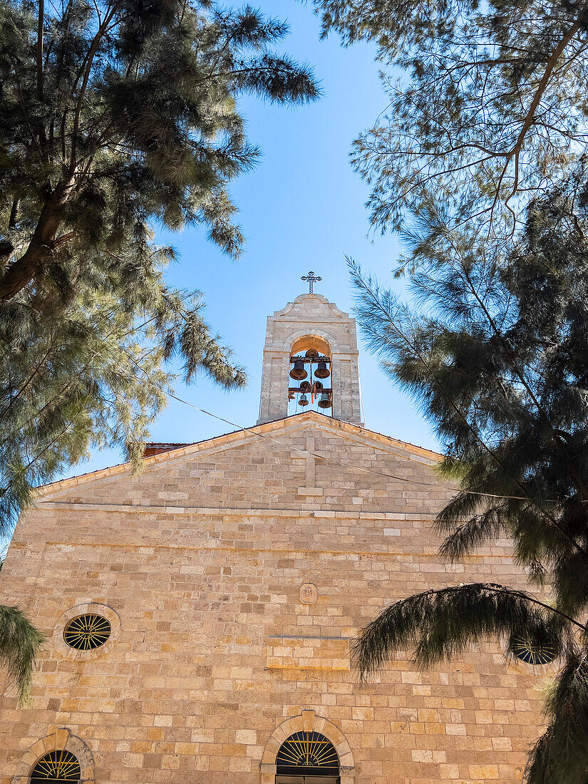 Exterior view of the early Byzantine Church of Saint George in Madaba, Jordan, Middle East\n