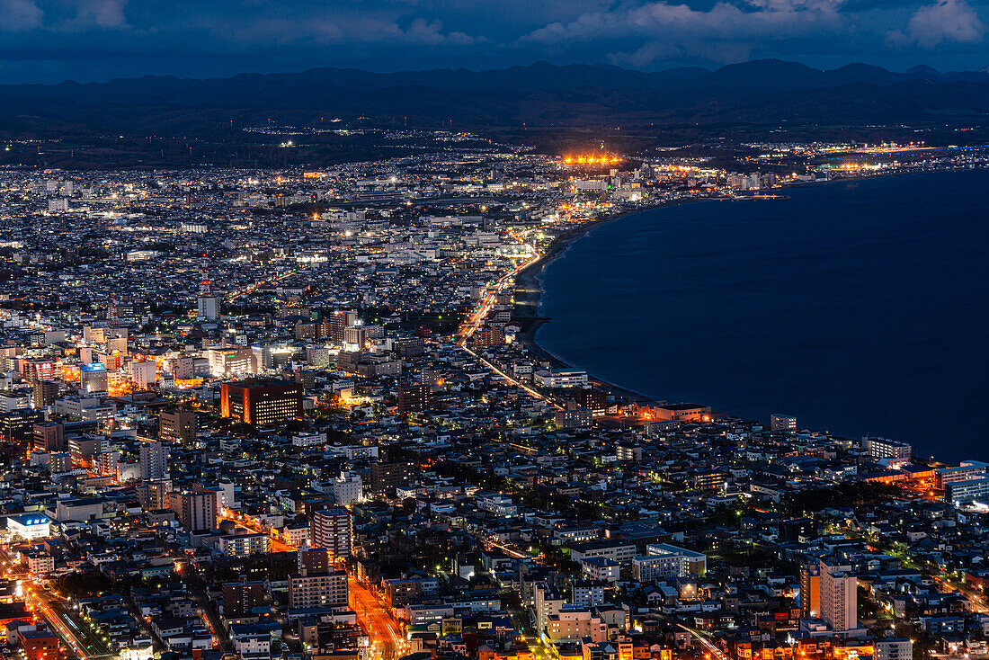 Aerial of the skyline of Hakodate at night, Hakodate, Hokkaido, Japan, Asia\n