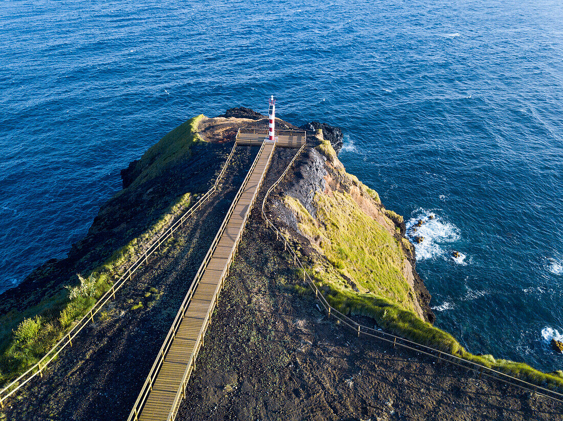 Aerial view of Farolim dos Fenais da Ajuda lighthouse on a cliff, Sao Miguel island, Azores Islands, Portugal, Atlantic, Europe\n