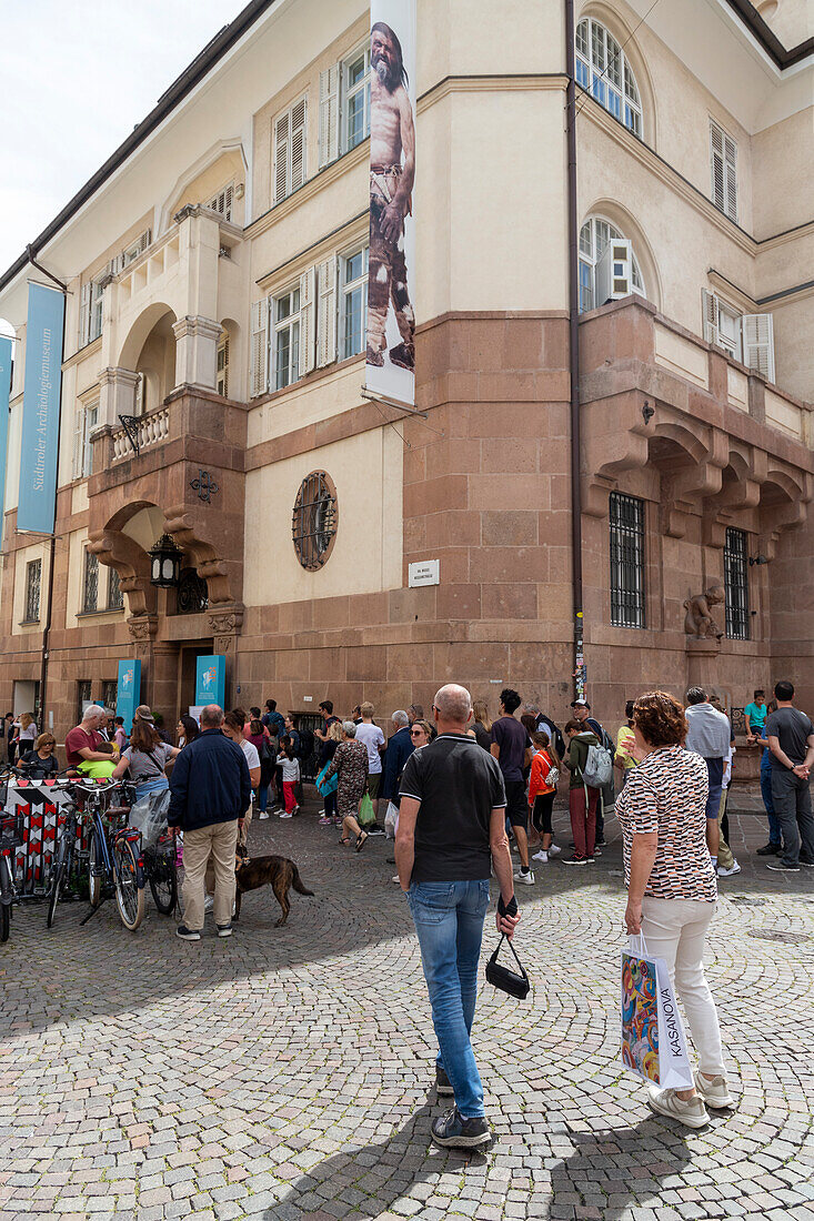 Queue of people at the Archaeological Museum in Bozen, Sudtirol (South Tyrol), Bolzano district, Italy, Europe\n