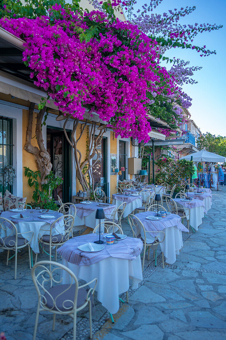 View of restaurant in Fiscardo harbour, Fiscardo, Kefalonia, Ionian Islands, Greek Islands, Greece, Europe\n