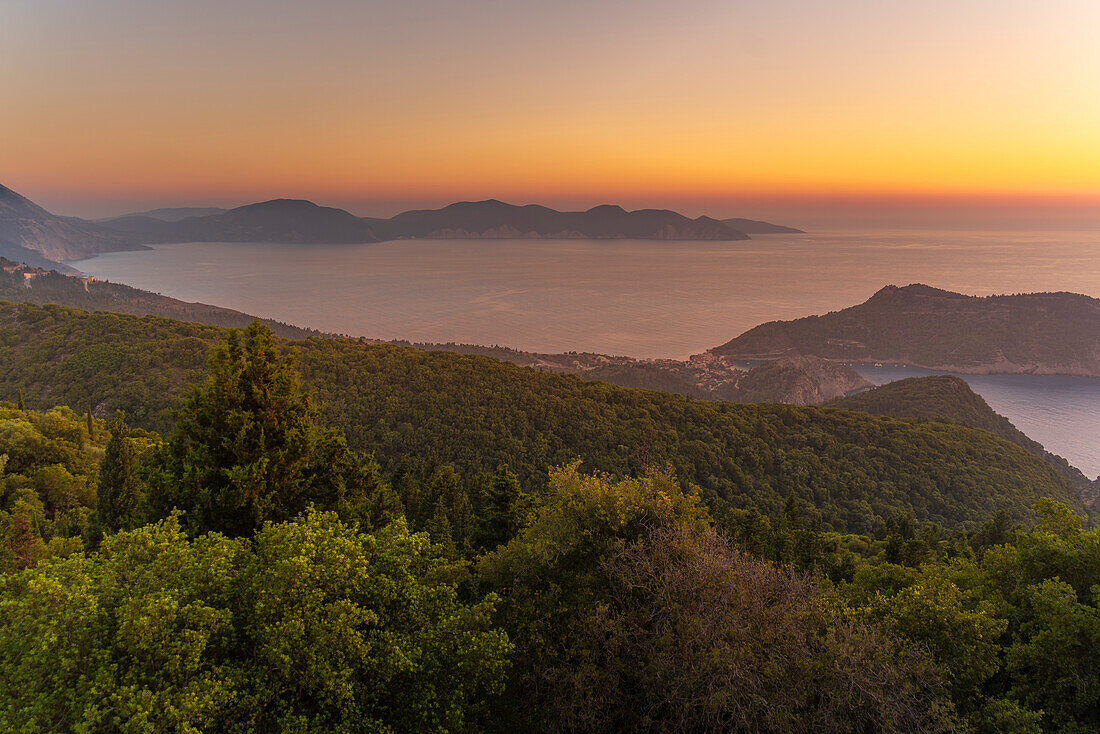 View of Assos, coastline, sea and hills at sunset, Kefalonia, Ionian Islands, Greek Islands, Greece, Europe\n