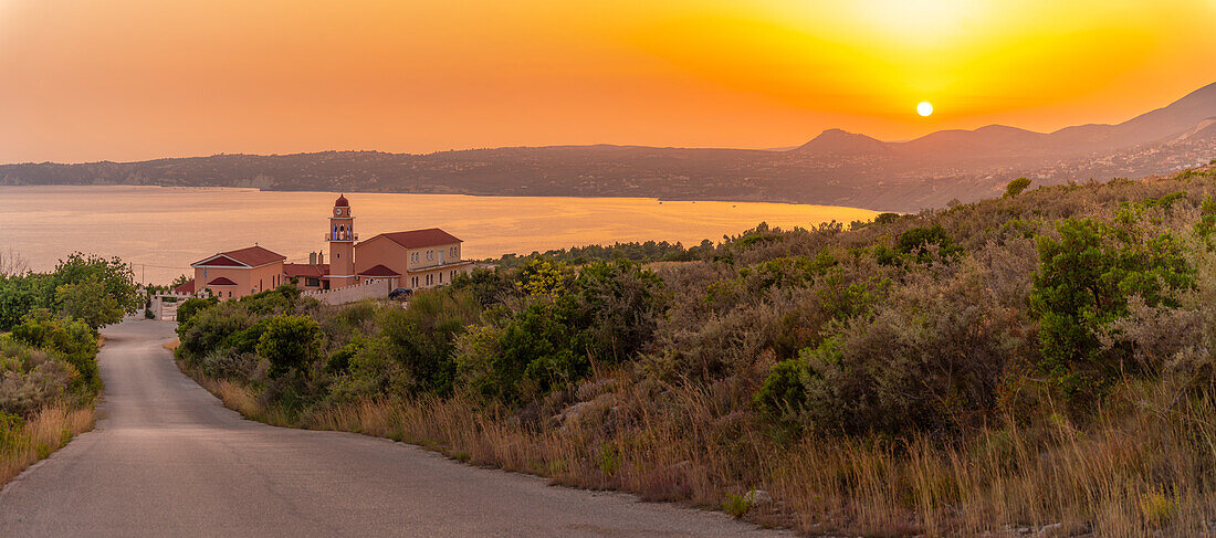 View of Holy Monastery of the Most Holy Theotokos of Sissia near Lourdata at sunset, Kefalonia, Ionian Islands, Greek Islands, Greece, Europe\n