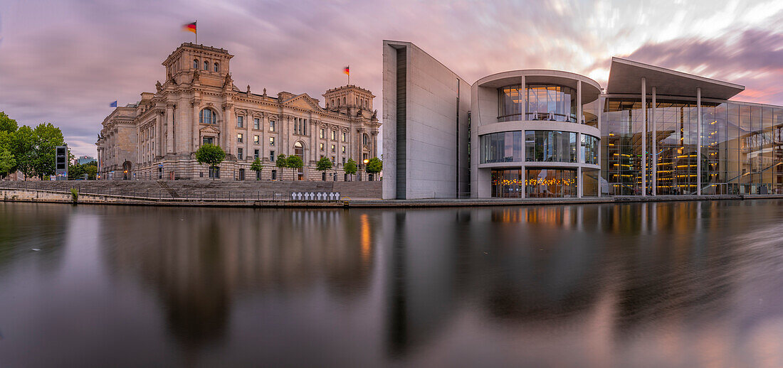 View of the River Spree and the Reichstag (German Parliament building) and Paul Loebe Building at sunset, Mitte, Berlin, Germany, Europe\n