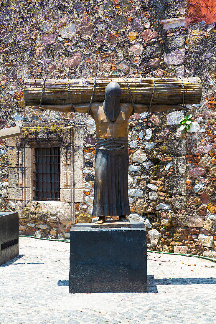 Religious Statue of penitent, Ex-Convent of San Bernardino de Siena, Taxco, Guerrero, Mexico, North America\n