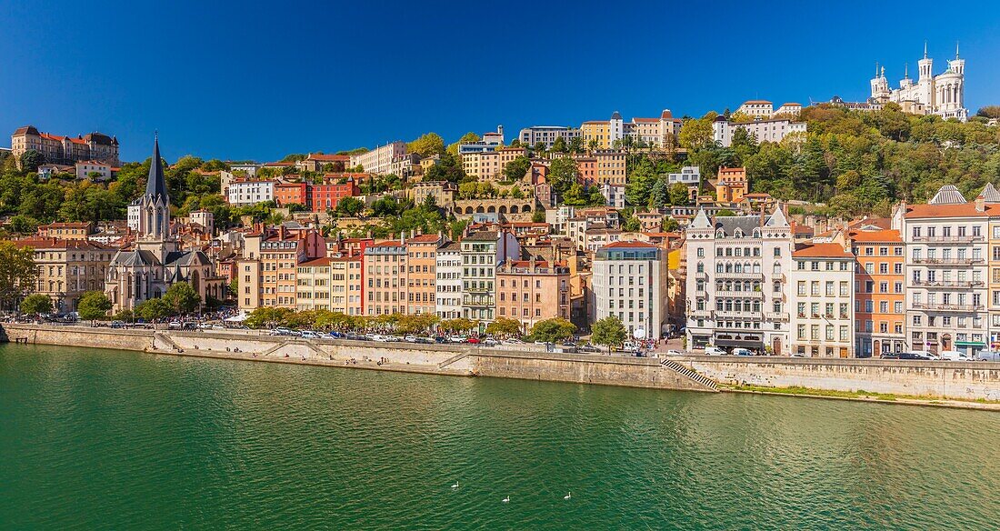 France, Rhone, Lyon, historic district listed as a UNESCO World Heritage site, Old Lyon, Quai Fulchiron on the banks of the Saone river, Saint Georges church, the Blanchon house, the Notre-Dame de Fourviere basilica and the Saint-Just high school on the Fourvière hill\n