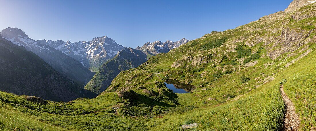 France, Hautes Alpes, national park of Ecrins, valley of Valgaudemar, La Chapelle en Valgaudemar, lake Lauzon (2008m) and Sirac (3441m) in the background\n
