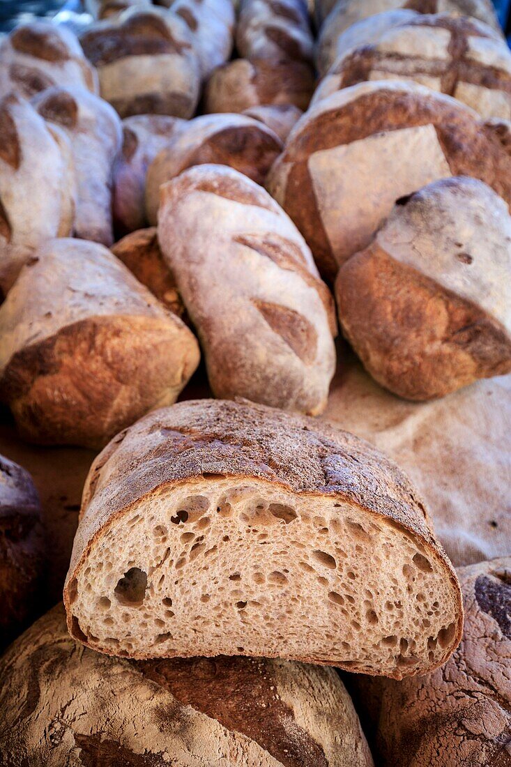 France, Alpes Maritimes, Parc Naturel Regional des Prealpes d'Azur, Gourdon, labeled Les Plus Beaux Villages de France, Farming party of Gorges du Loup, bread stall\n