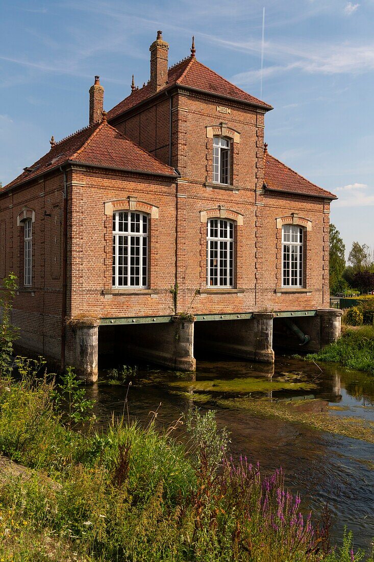 France, Somme, Valley of the Somme, Long, the banks of the Somme along the river, view of the former hydroelectric plant classified historic monument\n