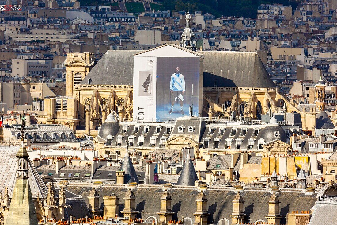 France, Paris, advertising tarpaulin on the Saint Eustache church\n