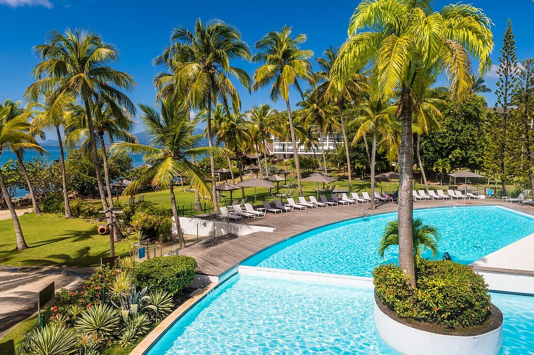 France, Caribbean, Lesser Antilles, Guadeloupe, Grande-Terre, Le Gosier, Hotel Creole Beach, swimming pool and tropical garden\n