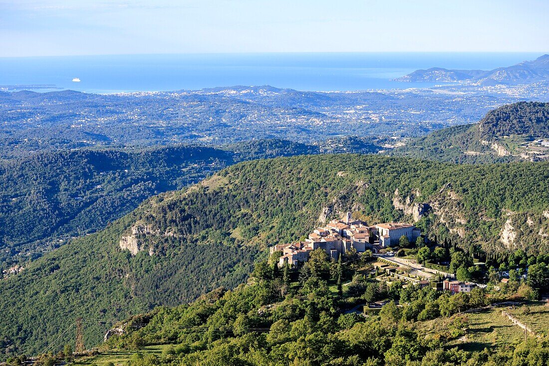 France, Alpes Maritimes, Parc Naturel Regional des Prealpes d'Azur, Gourdon, labeled Les Plus Beaux Villages de France, the coast of the Côte d'Azur and Esterel in the background\n