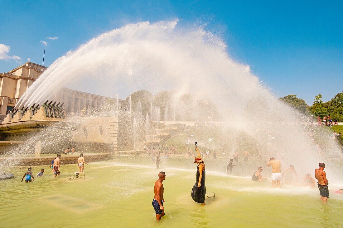 France, Paris, area listed as World Heritage by UNESCO, the Trocadero gardens during hot days, swimming\n