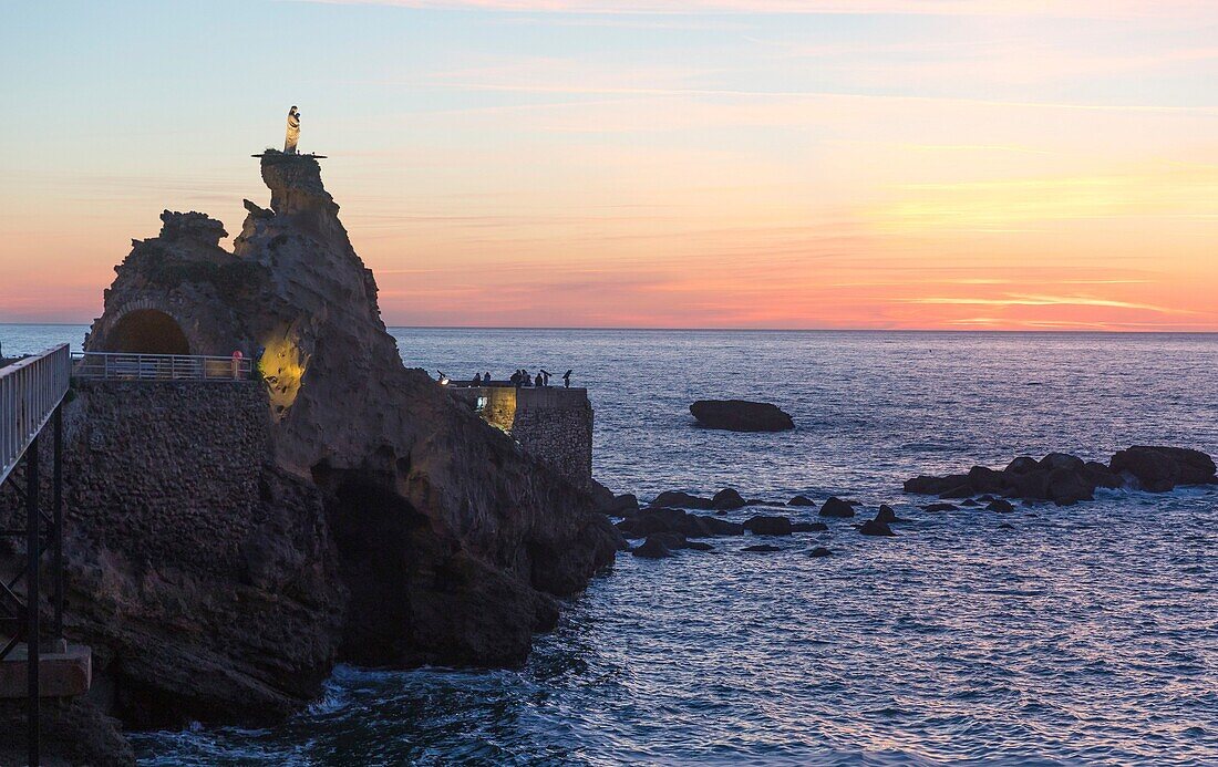 France, Pyrenees-Atlantiques, Biarritz, sunset at the Rocher de la Vierge\n