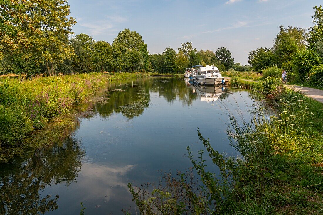 France, Somme, Valley of the Somme, Long, the banks of the Somme along the river, Pleasure boats and barges covered the river\n