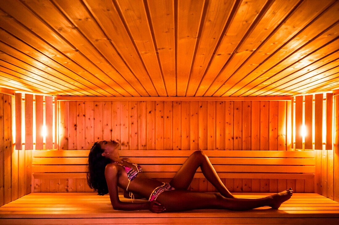 France, Caribbean, Lesser Antilles, Guadeloupe, Grande-Terre, Le Gosier, a woman relaxes at the spa of the hotel Creole Beach\n