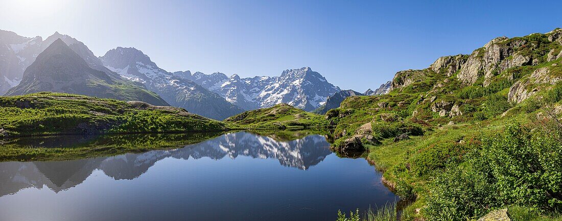 France, Hautes Alpes, national park of Ecrins, valley of Valgaudemar, La Chapelle en Valgaudemar, reflection of les Bans (3669m) and Sirac (3441m) on the lake of Lauzon (2008m)\n