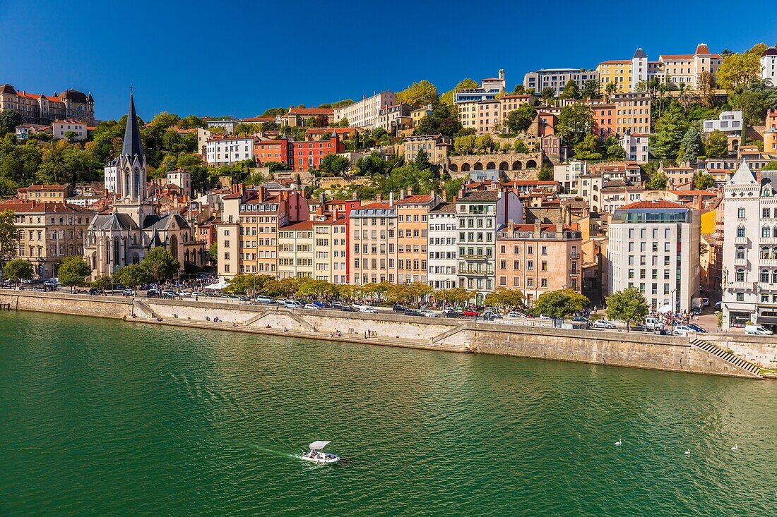 France, Rhone, Lyon, historic district listed as a UNESCO World Heritage site, Old Lyon, Quai Fulchiron on the banks of the Saone river, Saint Georges church, the Blanchon house and the Saint-Just high school on the Fourviere hill\n