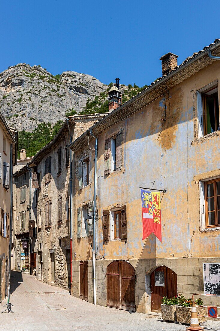France, Hautes-Alpes, Regional Natural Park of the Baronnies Provencal, Orpierre, paved alley of the old village\n