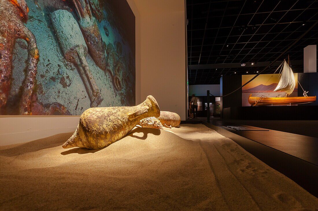 France, Gard, Nimes, Musee de la Romanite by architect Elizabeth de Portzamparc, Pompeii exhibition, amphore and Roman boat\n