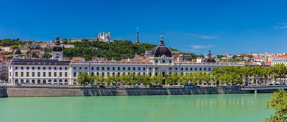 France, Rhone, Lyon, historical site listed as World Heritage by UNESCO, Rhone River banks with a view of Hotel Dieu and Notre Dame de Fourviere Basilica\n