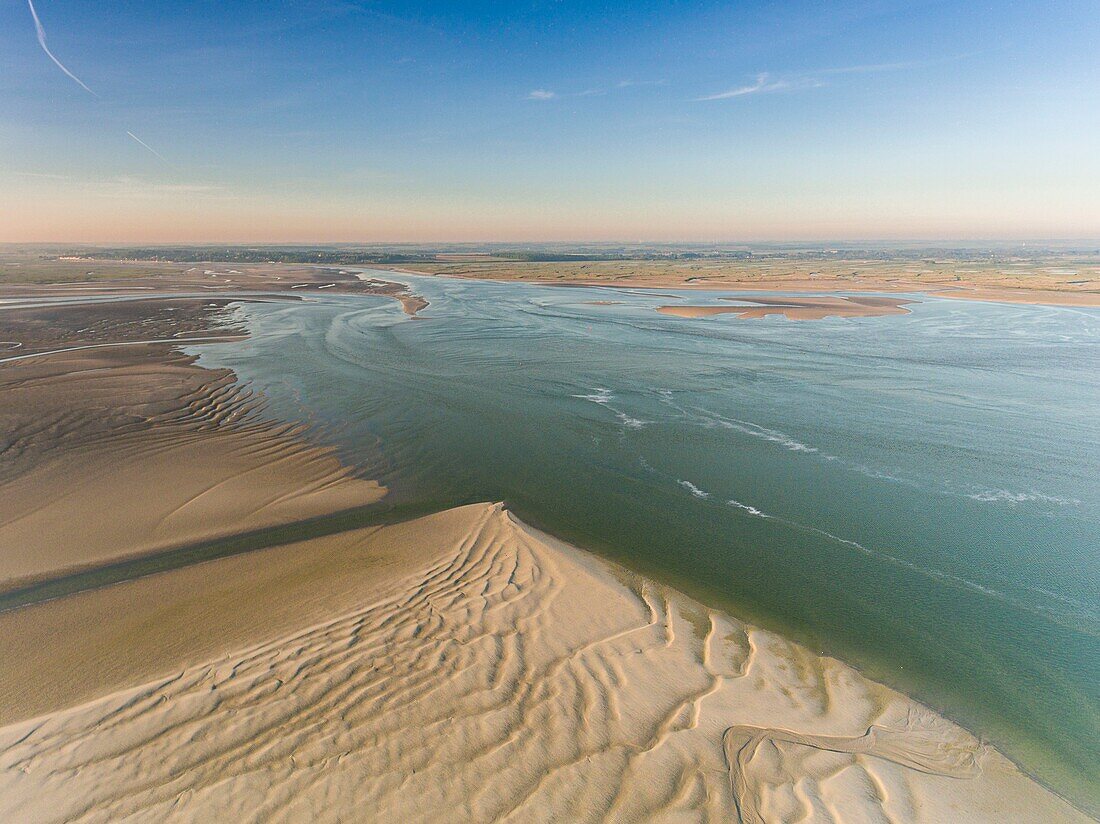 France, Somme, Baie de Somme, Le Crotoy, the Bay of Somme at low tide in the early morning, Saint-Valery-sur-Somme in the background (aerial view)\n