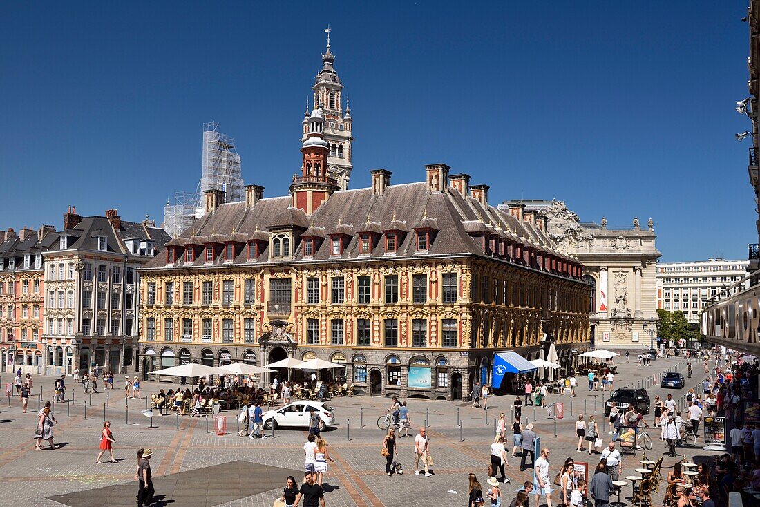 France, Nord, Lille, Place du General De Gaulle or Grand Place, old stock market and belfry of the Chamber of Commerce and Industry with the Opera in the background\n