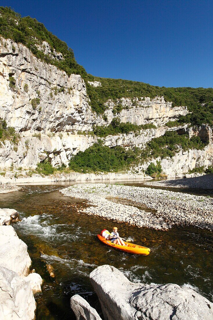 France, Ardeche, Ardeche Gorges National Natural Reserve, Sauze, tourist on a kayak in the Ardeche canyon\n