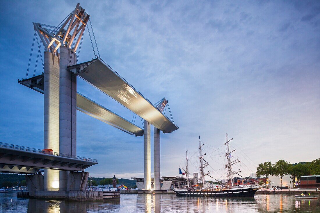 France, Seine Maritime, Rouen, Armada 2019, Belem, three masted schooner, sailing under Pont Flaubert at sunrise\n