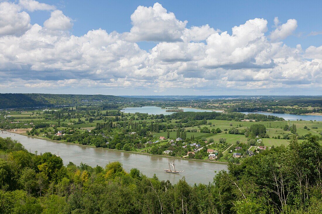 France, Eure, Barneville sur Seine, Armada 2019, elevated view of La Recouvrance, topsail schooner, sailing on the Seine River, among green countryside\n