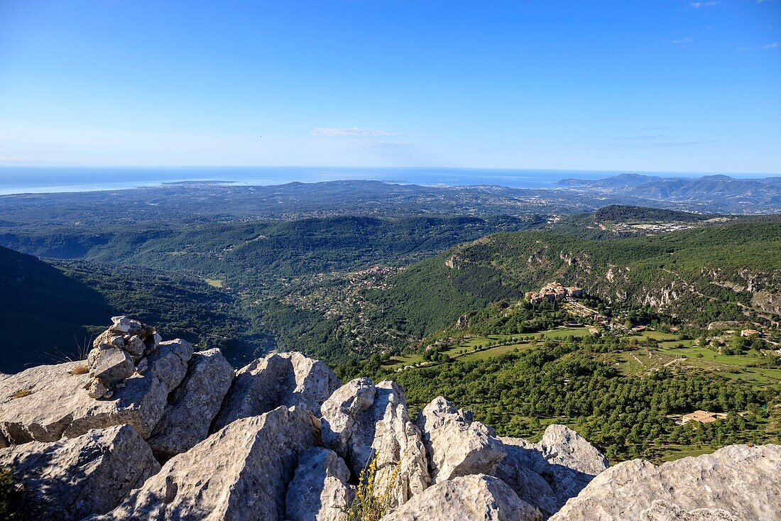 France, Alpes Maritimes, Parc Naturel Regional des Prealpes d'Azur, Gourdon, labeled Les Plus Beaux Villages de France, the coast of the Côte d'Azur and Esterel in the background\n