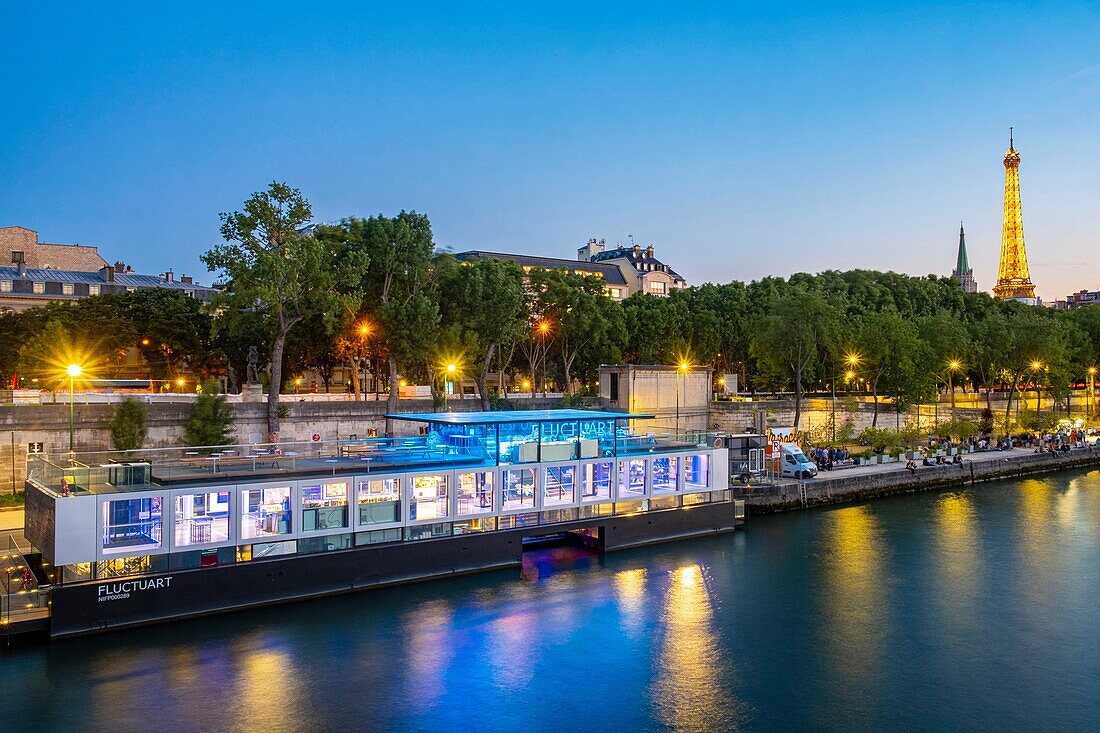 France, Paris, area listed as World Heritage by UNESCO, fly boat along the Ile de la Cite and the Eiffel Tower\n