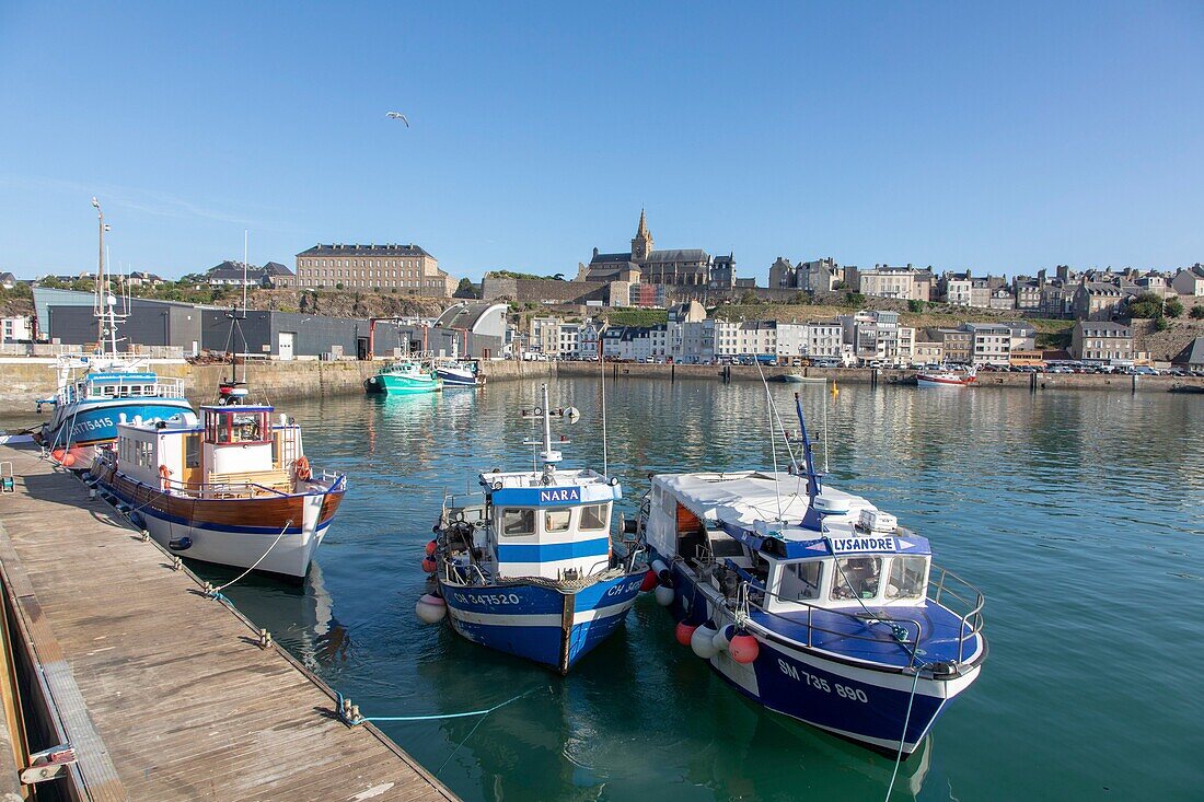 France, Manche, Cotentin, Granville, the Upper Town built on a rocky headland on the far eastern point of the Mont Saint Michel Bay, the fishing port and the Notre Dame du Cap Lihou\n