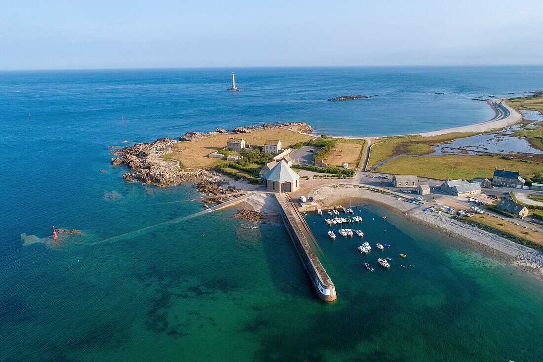 France, Manche, Cotentin, Cap de la Hague, Auderville, Goury harbour and the octogonal sea rescue station, Goury lighthouse in the background (aerial view)\n