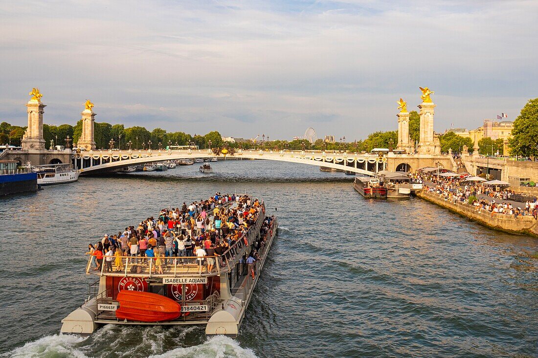 France, Paris, area listed as World Heritage by UNESCO, cruise on a boat in front of Alexandre III bridge\n