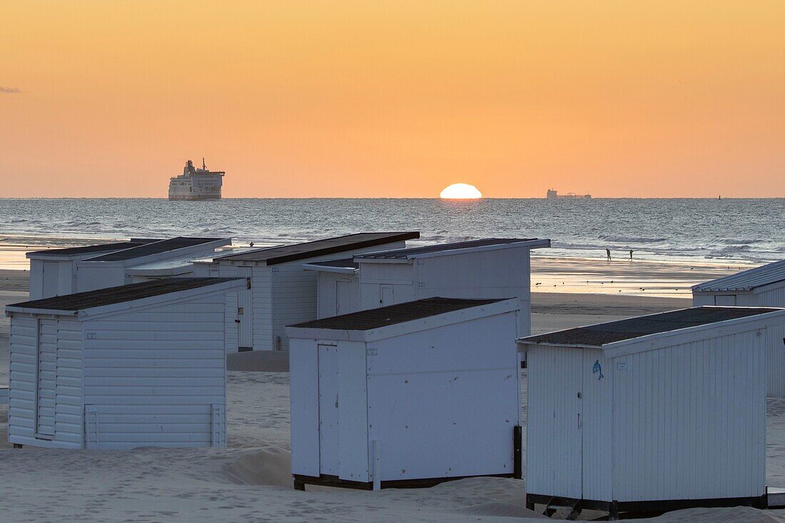 France, Pas de Calais, Calais, beach huts also known cabins at sunset\n