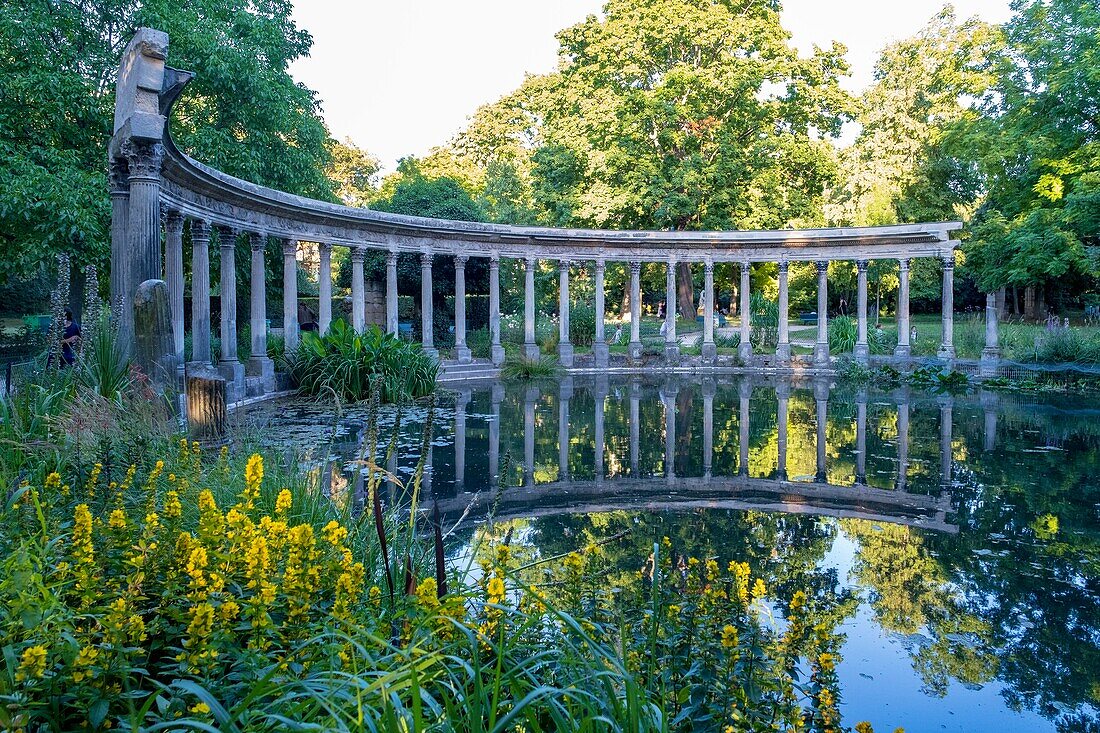 France, Paris, Parc Monceau, Naumachie, oval basin bordered by a Corinthian colonnad\n