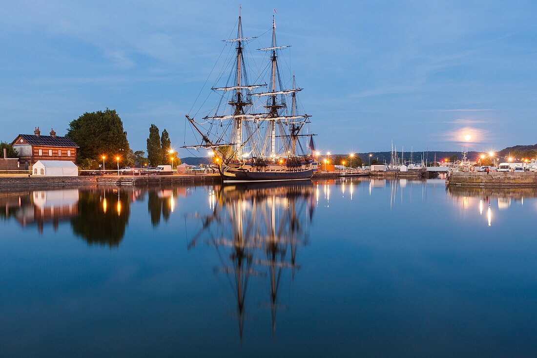 France, Calvados, Honfleur, Armada 2019, night view of Hermione, frigate, docked in Bassin du Commerce\n