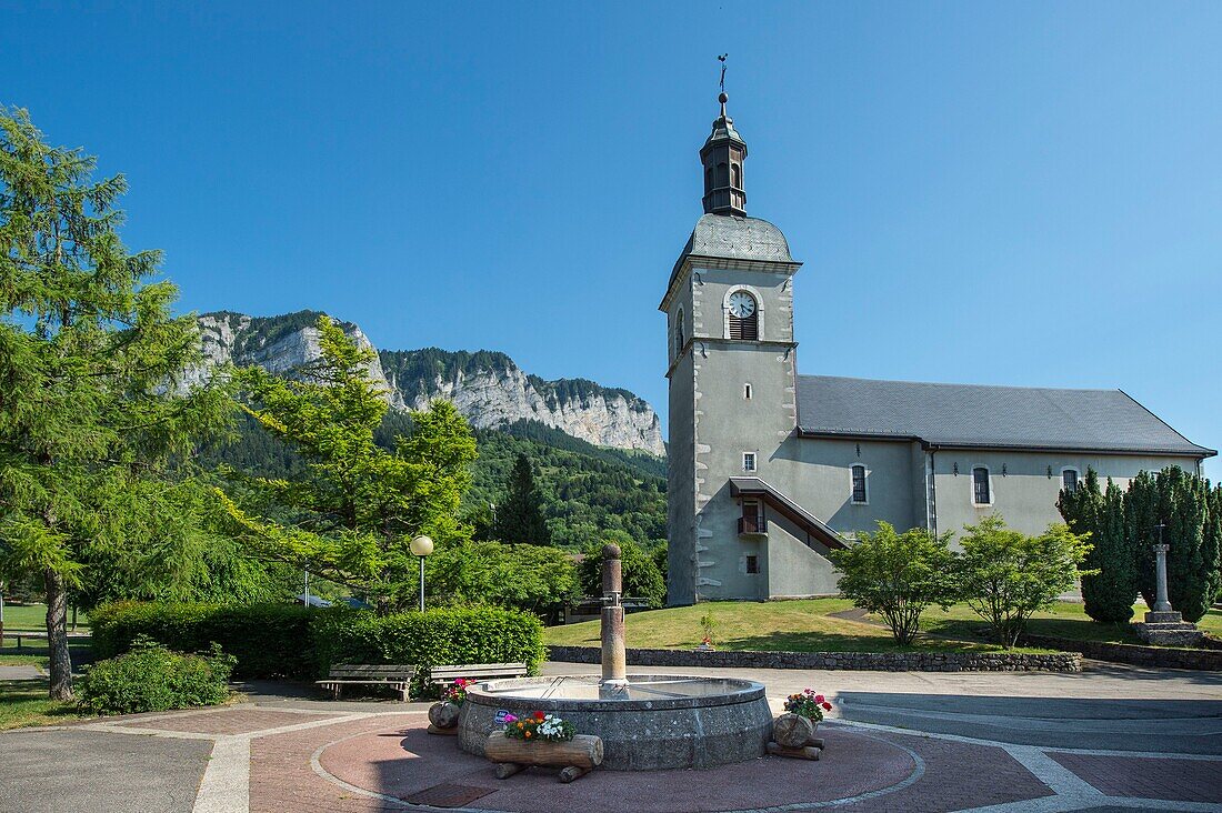 France, Haute Savoie, Chablais geopark massif, Thollon les Memises, the fountain at the foot of the Saint Michel church\n